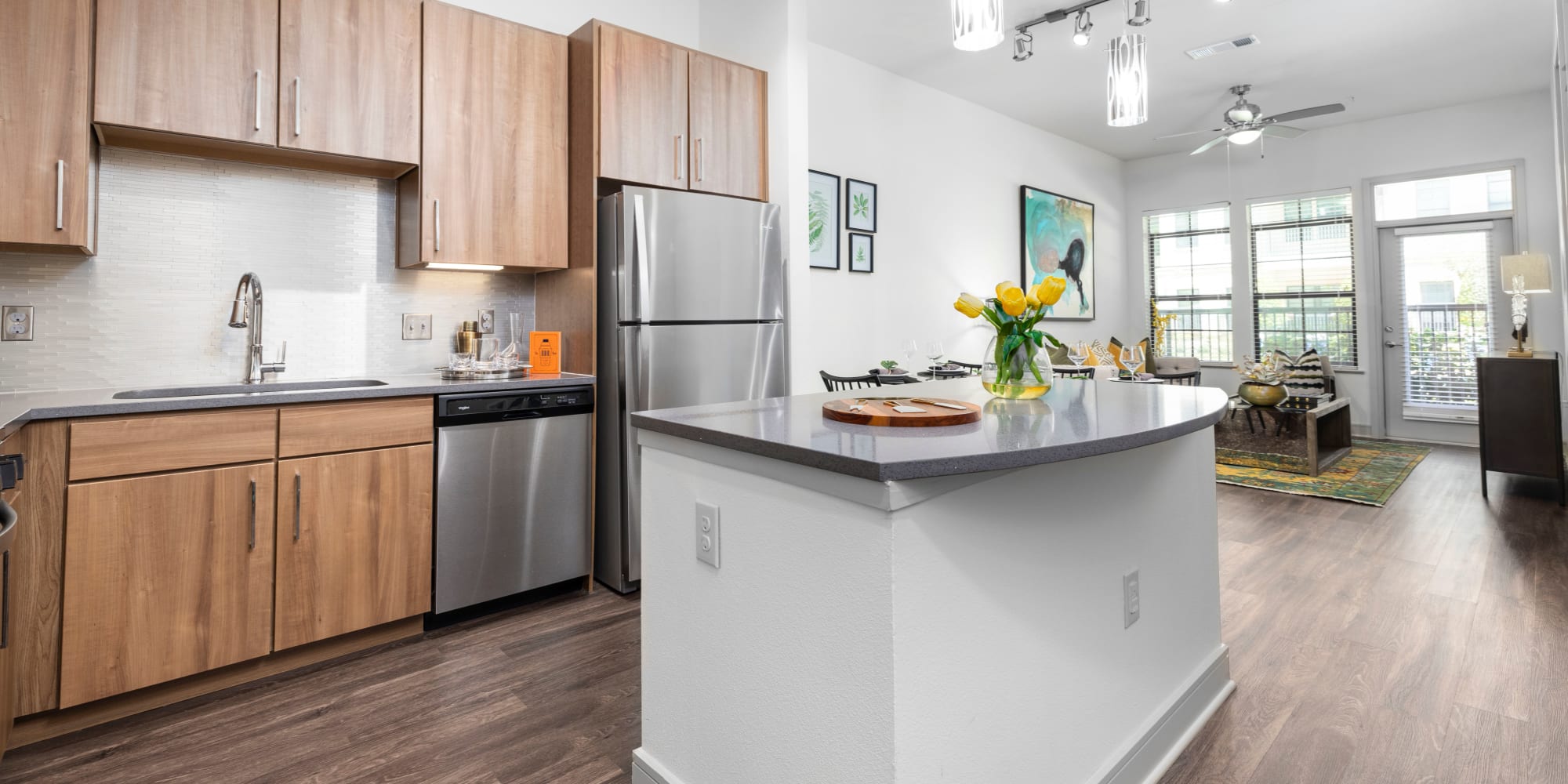 Beautiful kitchen with modern appliances at Olympus at Memorial in Houston, Texas