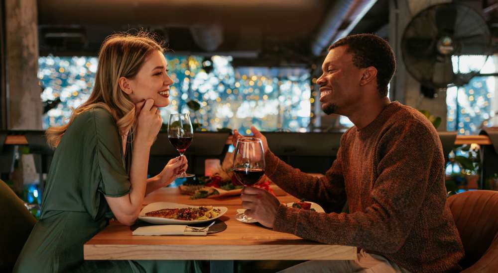 Couple having dinner at a restaurant near Main Street Living in Columbia, South Carolina
