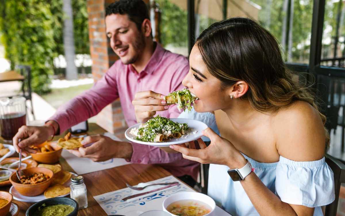 Resident having lunch at restaurant near Stratford Point in Sanford, Florida