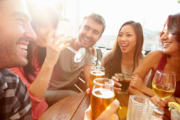 Friends at a brewery near Morehead West in Charlotte, North Carolina
