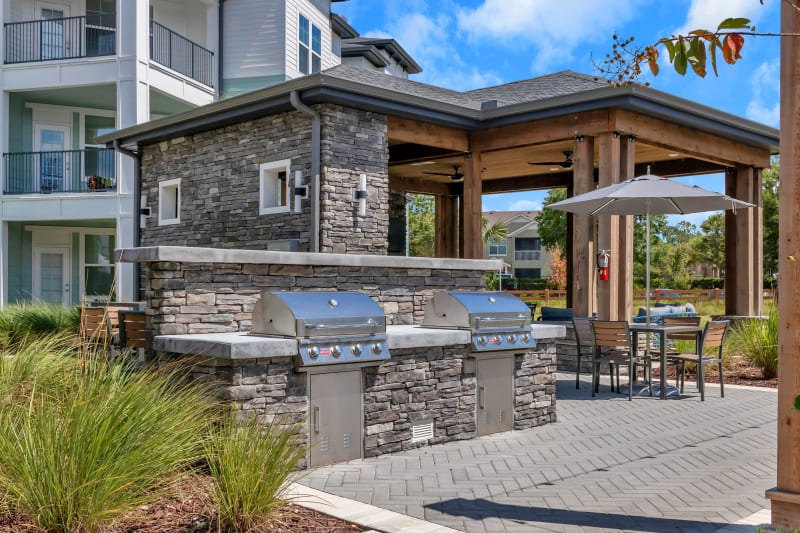 Grilling station and covered patio at Tapestry Westland Village in Jacksonville, Florida
