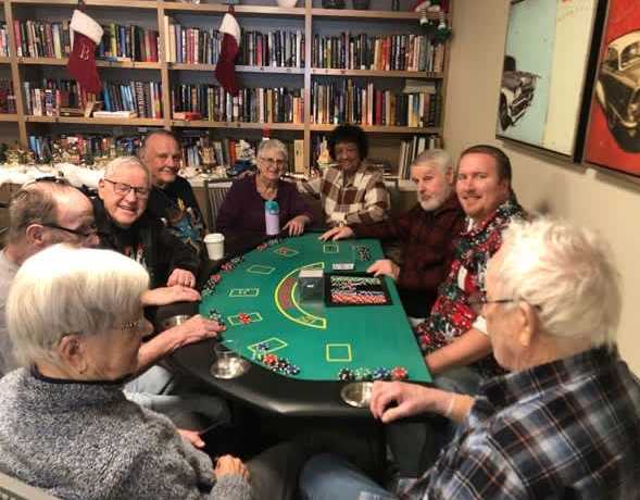 Senior residents playing a game of poker