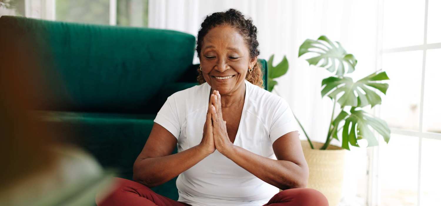 Resident meditating at Crenshaw Trace in Wake Forest, North Carolina