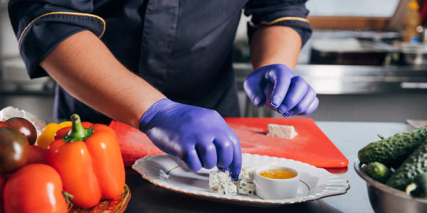 Chef cutting veggies at The Residences on Forest Lane in Montello, Wisconsin