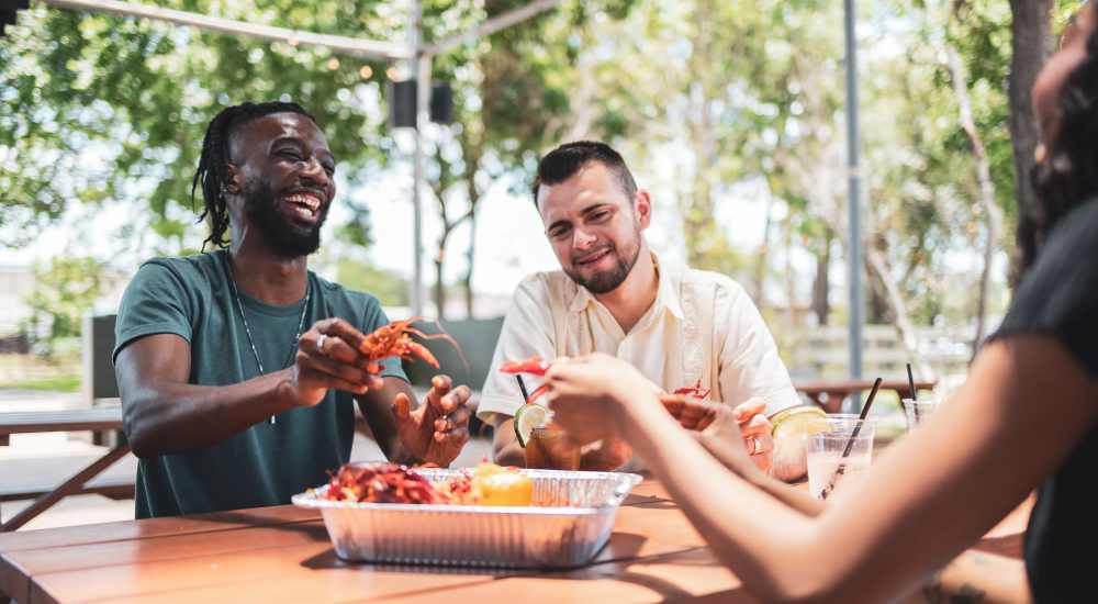 Friends out for food near The Camaron Townhomes & Flats in San Antonio, Texas