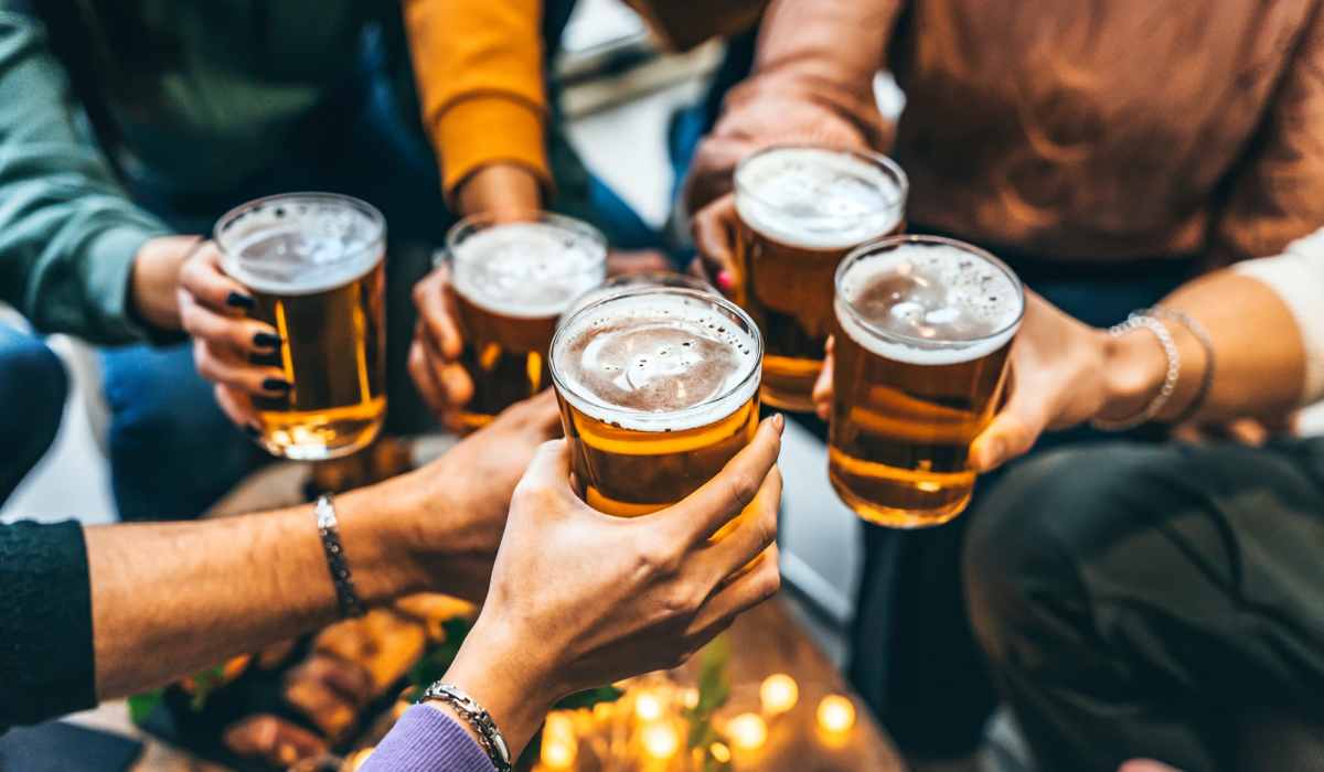 Friends enjoying beers at a nearby local bar at Sagewood Estates in Portland, Oregon