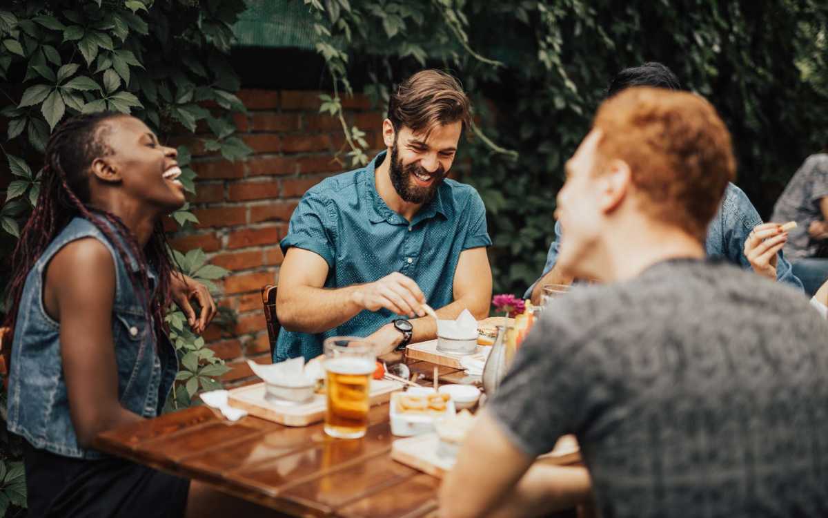 Residents having delicious food at a restaurant near Baywood Apartments in Gretna, Louisiana