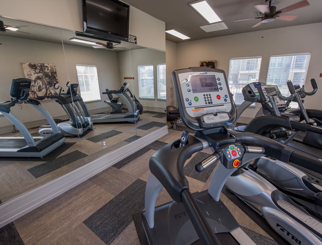Well equipped fitness center at The Remington Apartments in Wichita, Kansas