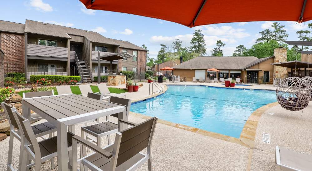 Pool with lounge area at Lexington in The Woodlands, Texas