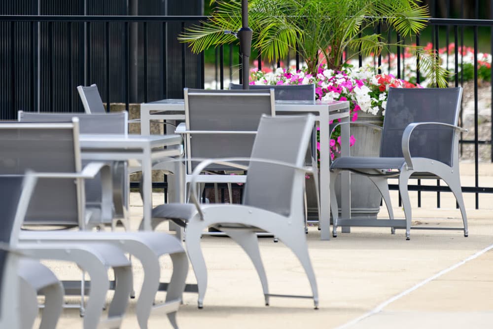 Seating area by the pool at Beacon Hill Apartments in Alexandria, Virginia