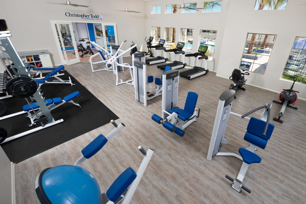 Fitness center with yoga studio at Christopher Todd Communities At Estrella Commons in Goodyear, Arizona