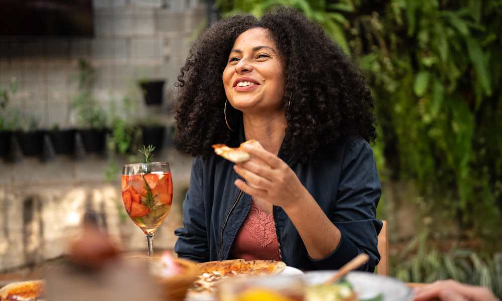 Resident having lunch at a restaurant near Columbia Landing in Columbia, Maryland