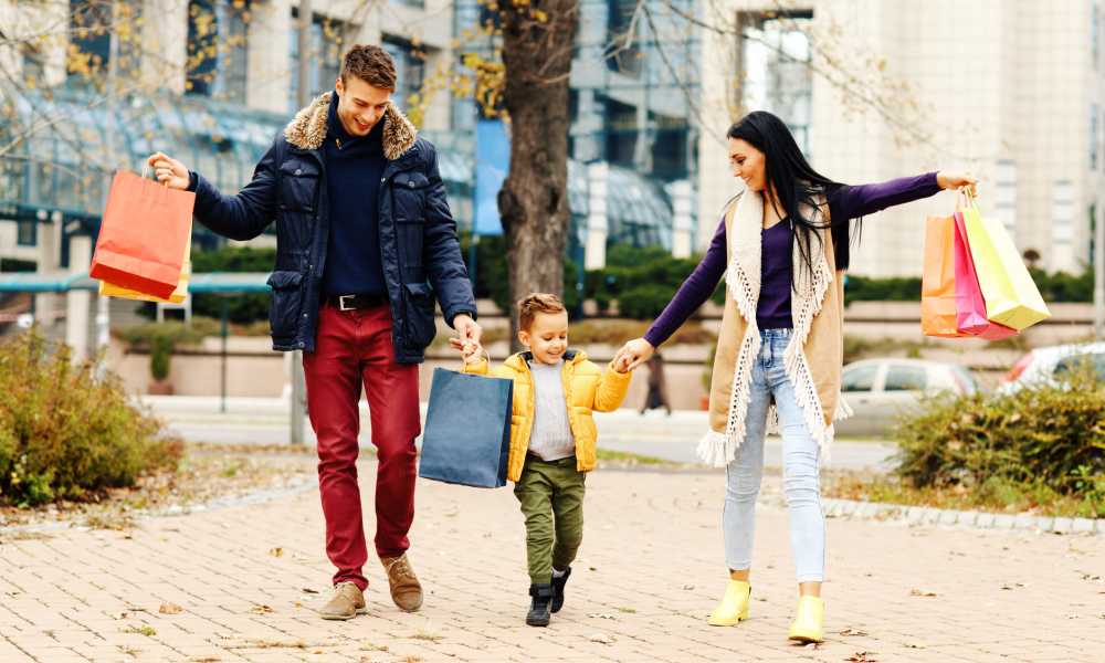 Resident family shopping and walking downtown near Beacon Station in Augusta, Georgia