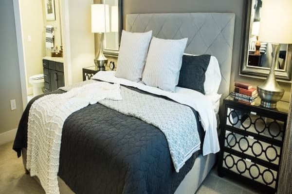 Comfortable bed at Berkshire Amber in Dallas, Texas