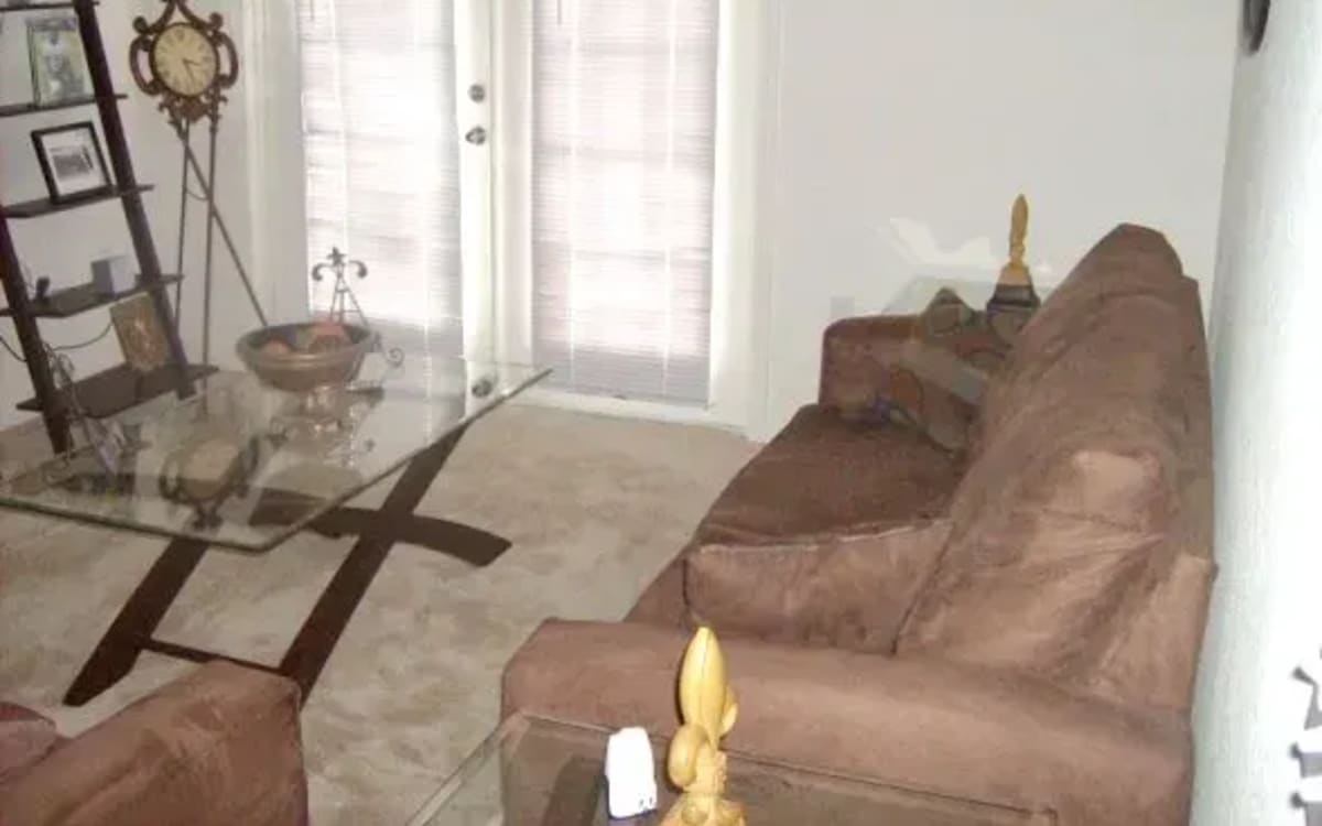 Living room at Ochlockonee Pointe Apartments in Midway, Florida