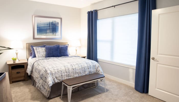 A bright, spacious bedroom at Attivo Trail in Ankeny in Ankeny, Iowa