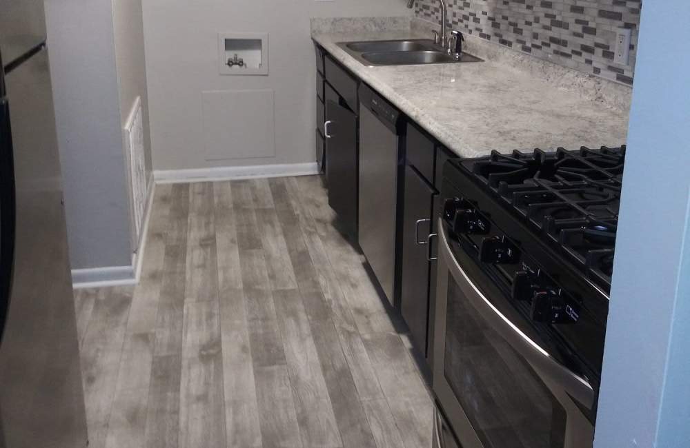 Kitchen with granite countertop  at Woodlea Oaks in Taylors, South Carolina