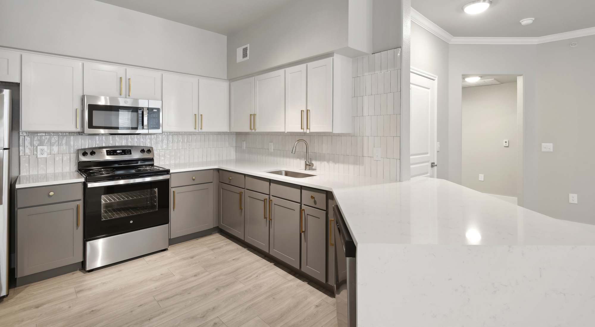 Kitchen with stainless steel appliance  at Collier in Pflugerville, Texas