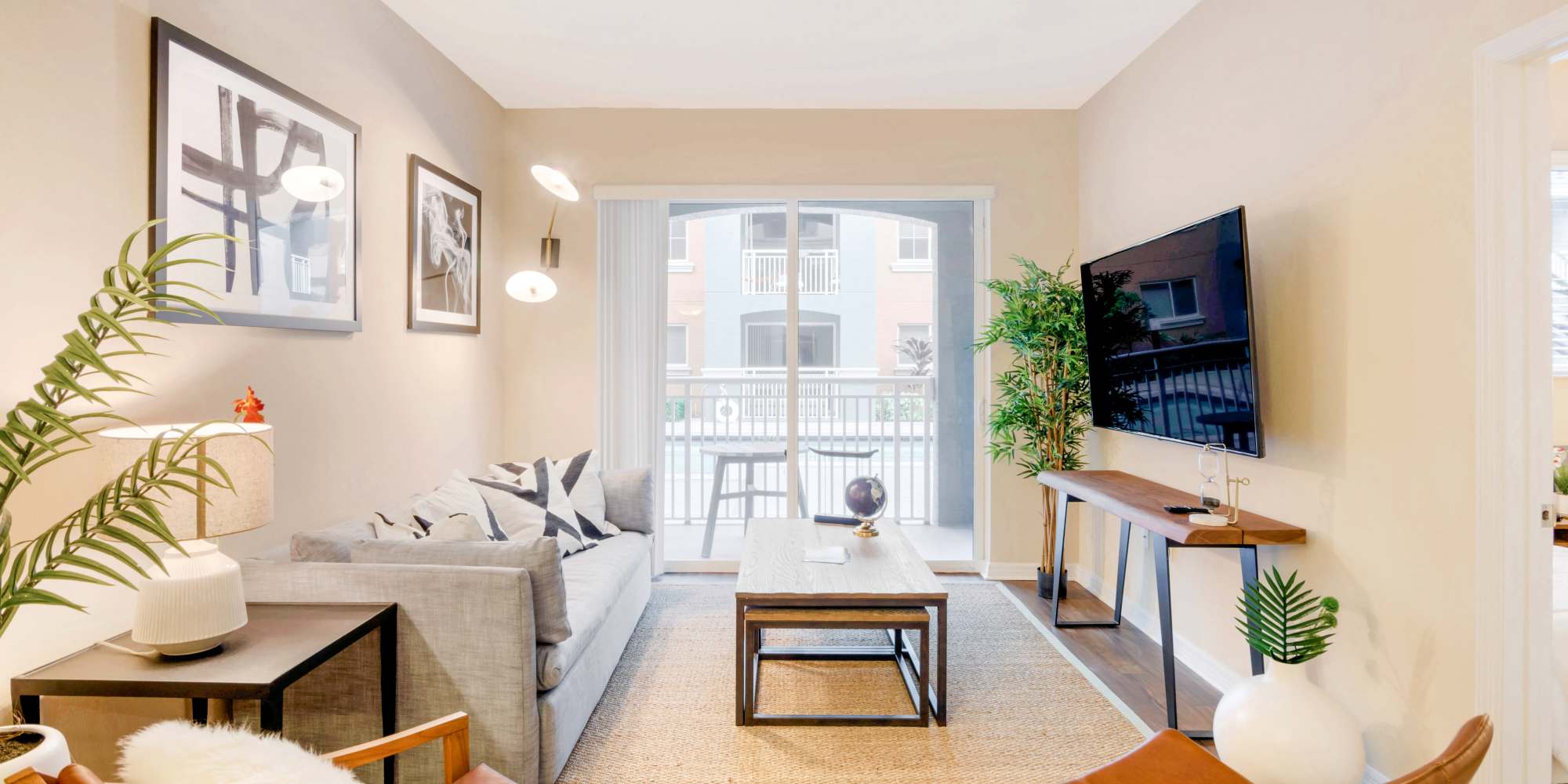 Cozy layout in a model home's living room at Red Road Commons in South Miami, Florida