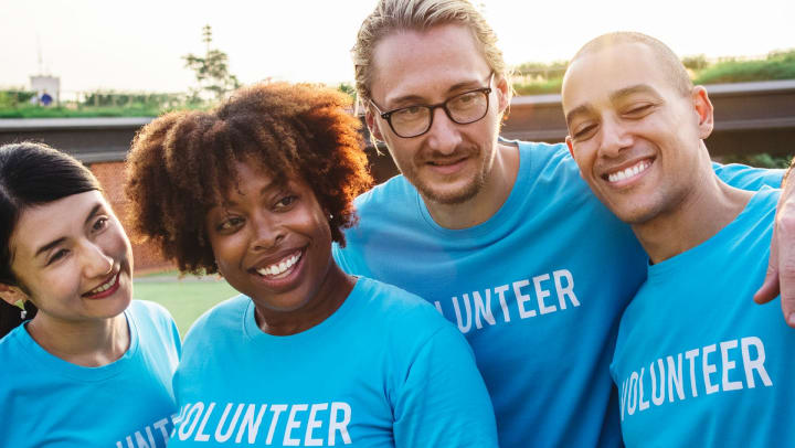 Community volunteers at Olympus Grand Crossing in Katy, Texas