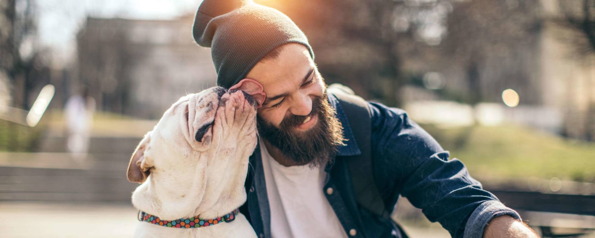 Resident and his four legged buddy enjoying the bark park at The Beverly at Clear Lake in Houston, Texas