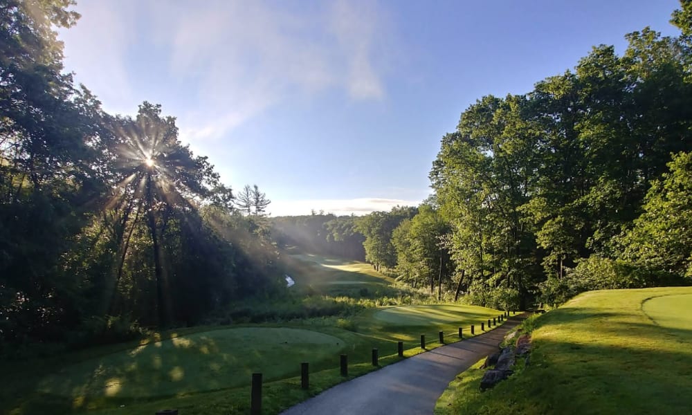 Group of people celebrating with sparklers at The Avenue at Greenmont in Dracut, Massachusetts