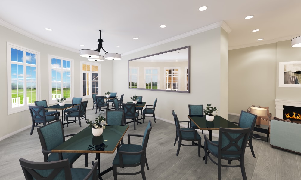 A large dining room with set tables at Keystone Place at Richland Creek in O'Fallon, Illinois