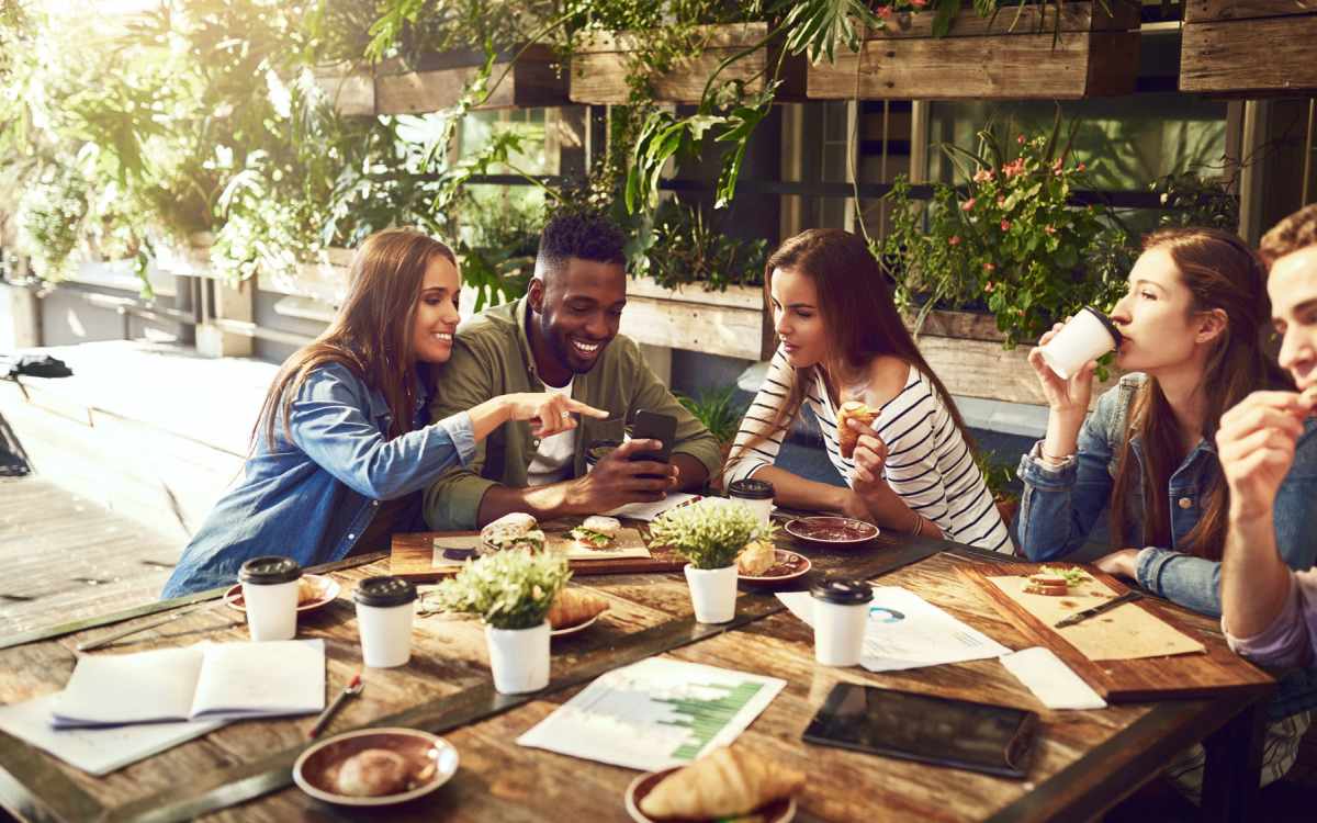 Residents eating lunch at a food truck near Heron Reserve in Charleston, South Carolina