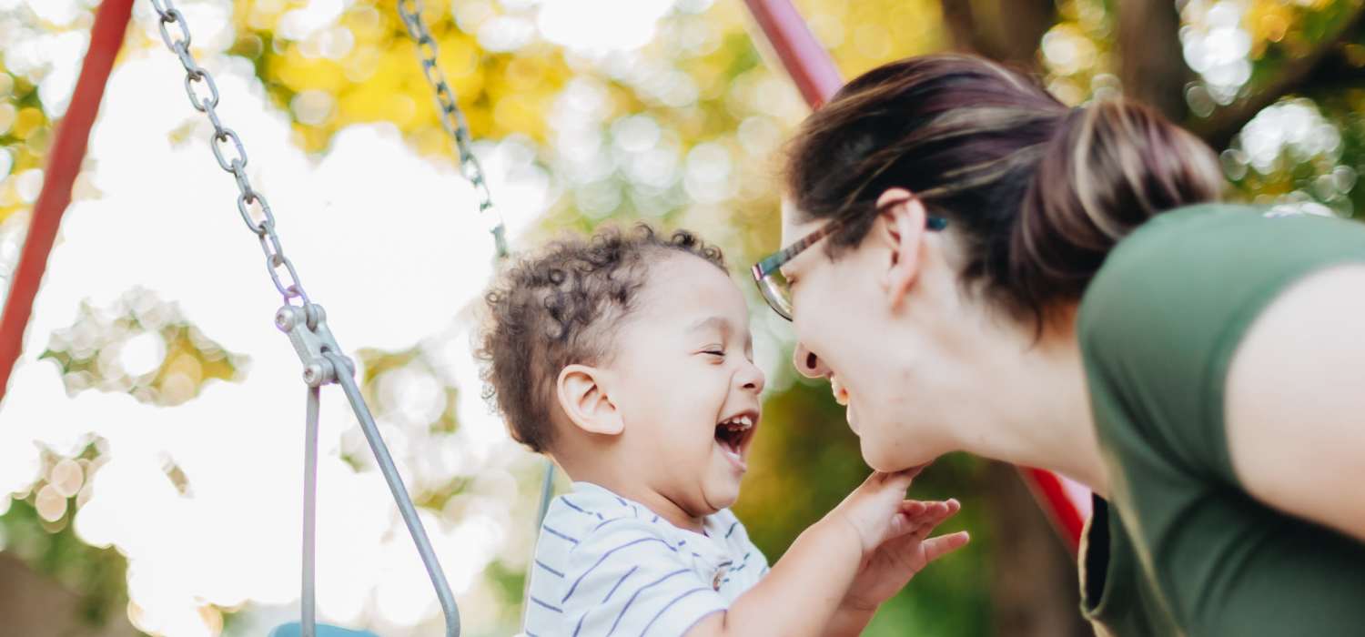 Resident playing with her son at Legacy Trace in Benson, North Carolina