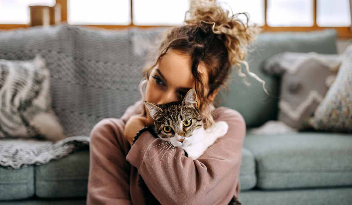 Resident hugging her cat at Granite Creek in Rocklin, California