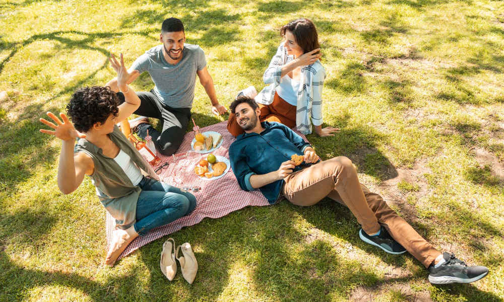 Resident friends doing picnic in park near The Villas at Keystone Canyon in Reno, Nevada
