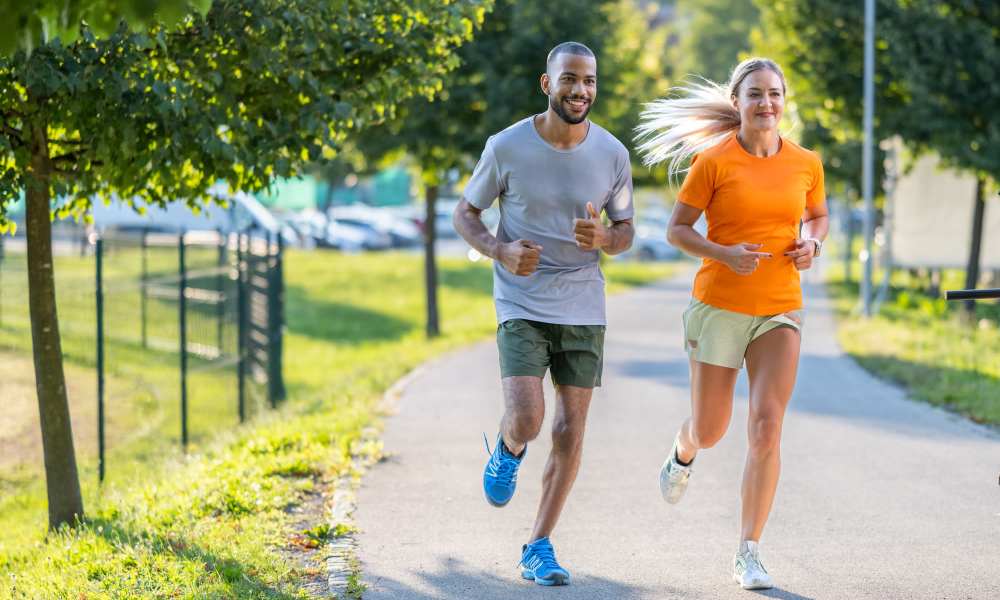 Resident couple going for a morning jog in a park near Oaks Pentagon Village in Edina, Minnesota