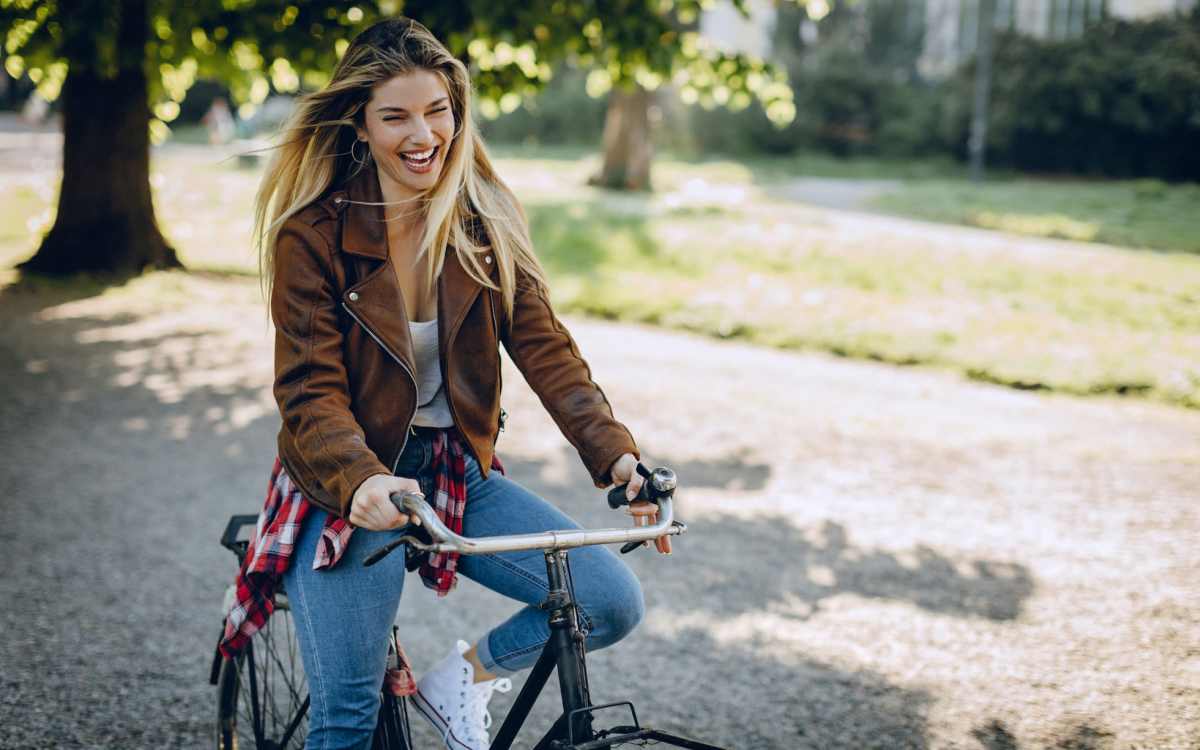 Residents commuting by bike in park near Ivey Ridge Apartments in Graham, North Carolina