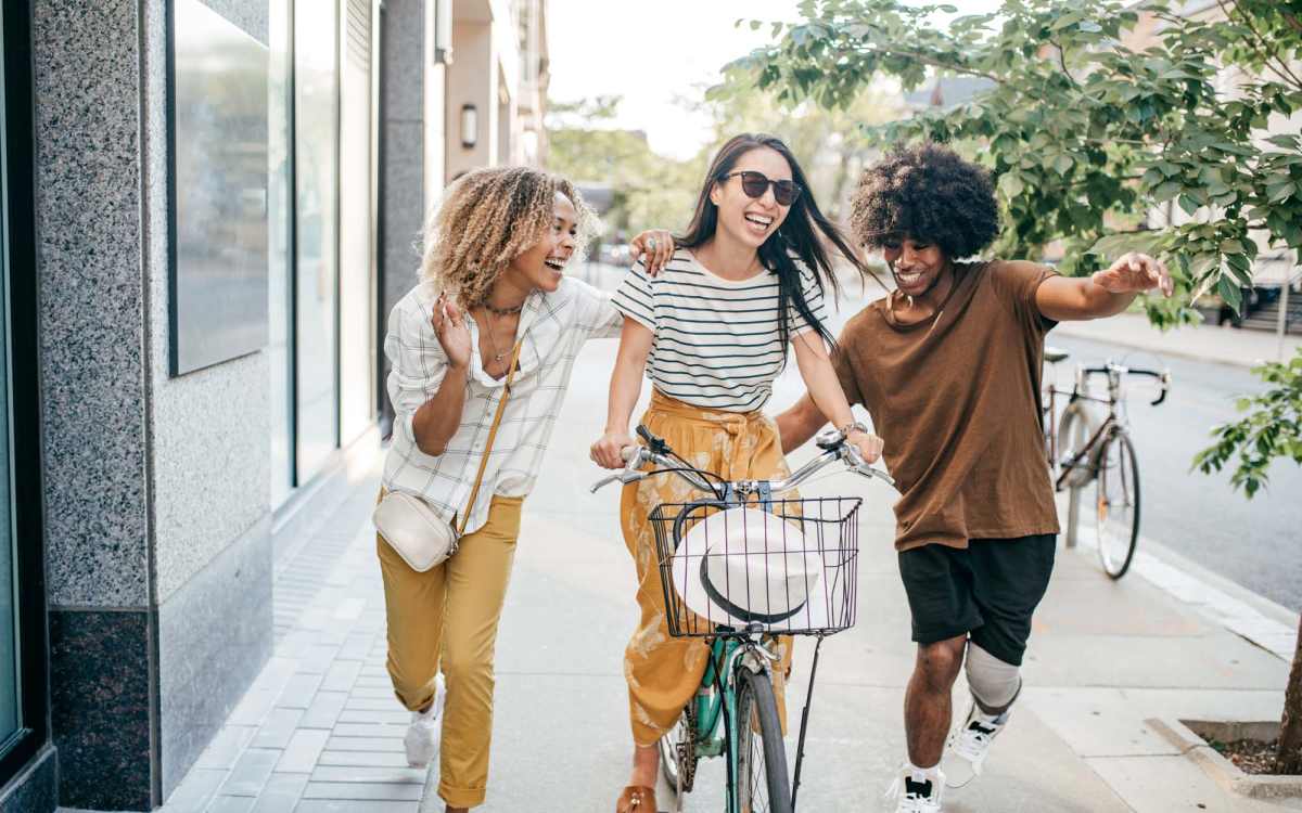 Resident friends going down a street near Skyline Tower in Fort Wayne, Indiana