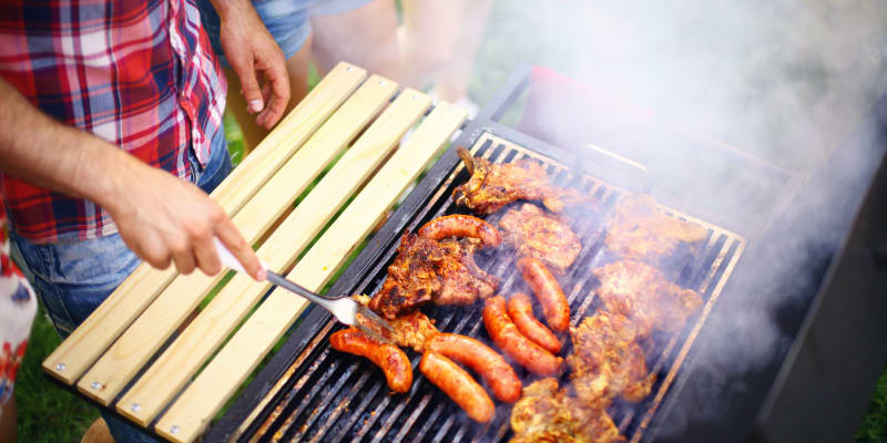 residents barbequing at Norwich Manor in Norfolk, Virginia