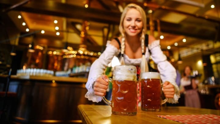 Women serving beers at a local restaurant near Olympus Corsair Apartments in San Diego, California
