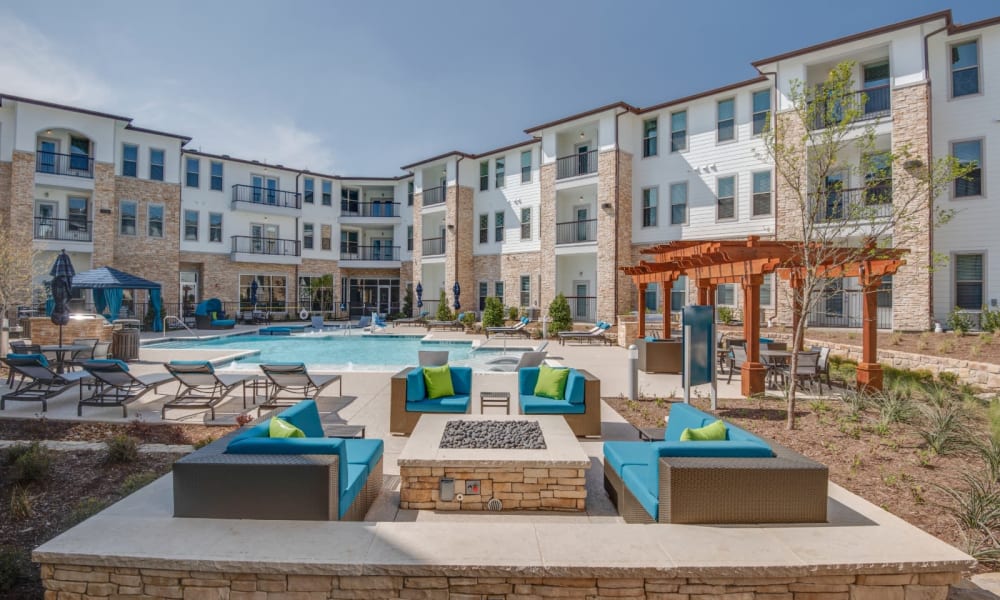 Tons of areas to lounge around the pool after a nice swim at Bellrock Upper North in Haltom City, Texas