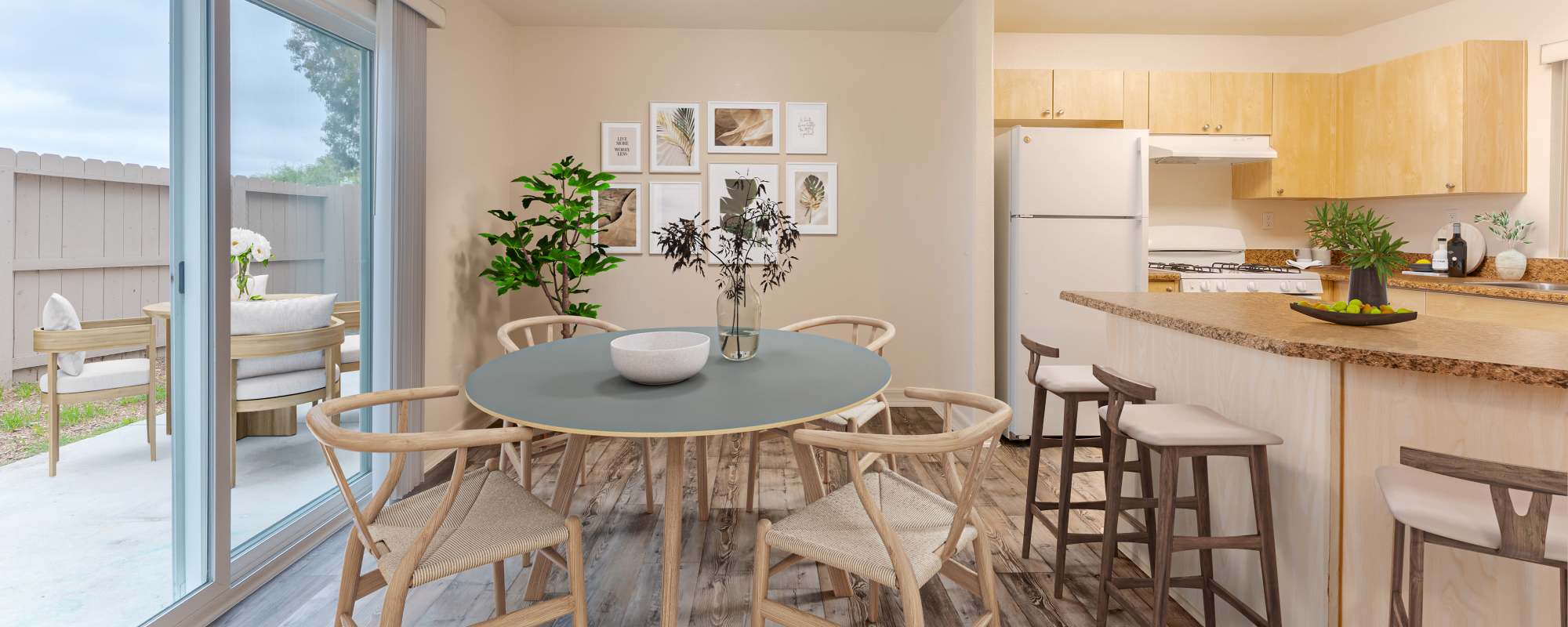 A dining room and  kitchen in a home at Vista Ridge in Vista, California