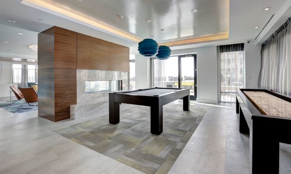 Game room with a ping-pong table at Solaire 7077 Woodmont in Bethesda, Maryland