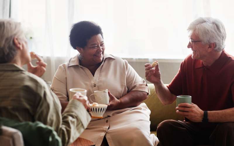Resident enjoying a cup of coffee at Tuscan Gardens of Venetia Bay in Venice, Florida