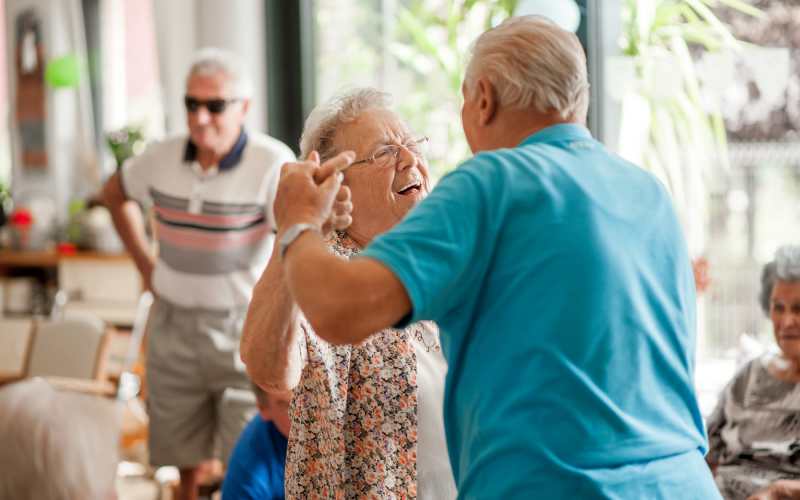 Resident dancing at Tuscan Gardens of Venetia Bay in Venice, Florida
