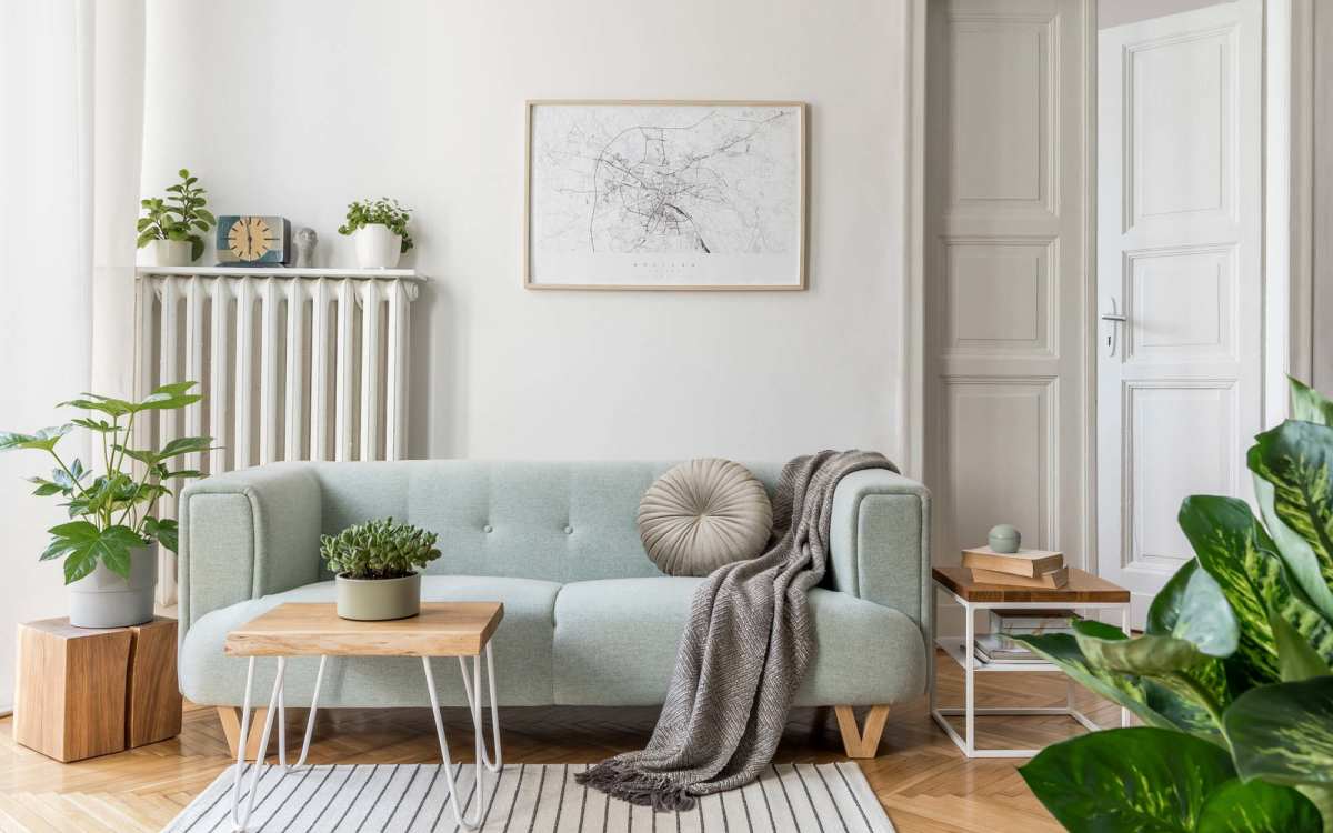 Spacious and well-furnished living area with hardwood flooring at Lofts At Glenhaven in Winston Salem, North Carolina
