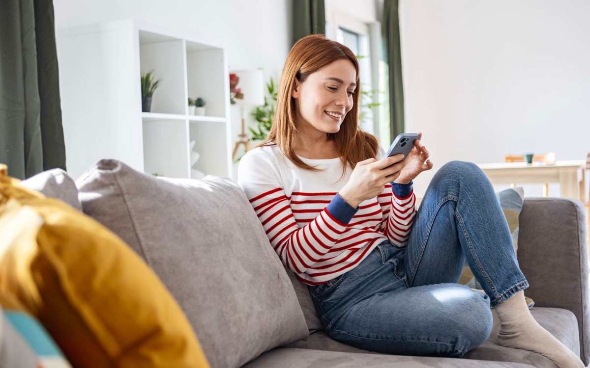Resident using portal form her cell phone at Cross Creek in Laurel, Maryland