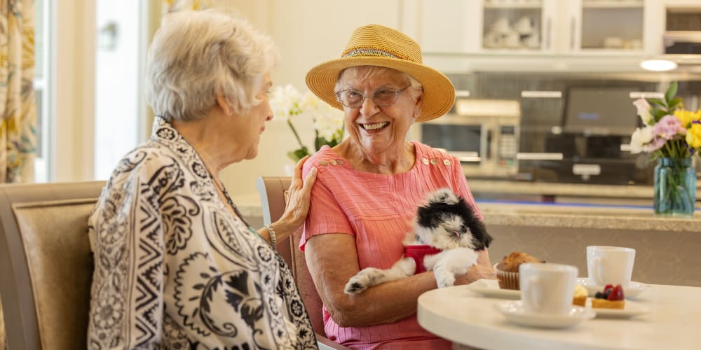 Resident women's having coffee in the community room at The Barclay at Clemson in Clemson, South Carolina