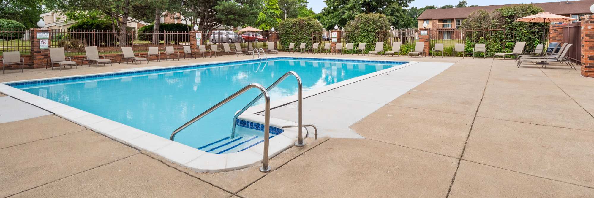 Pool at Evergreen Park Townhomes and Apartments in Lansing, Michigan