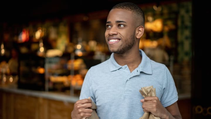 Resident picking up some takeout from his favorite restaurant near Anatole on Briarwood in Midland, Texas