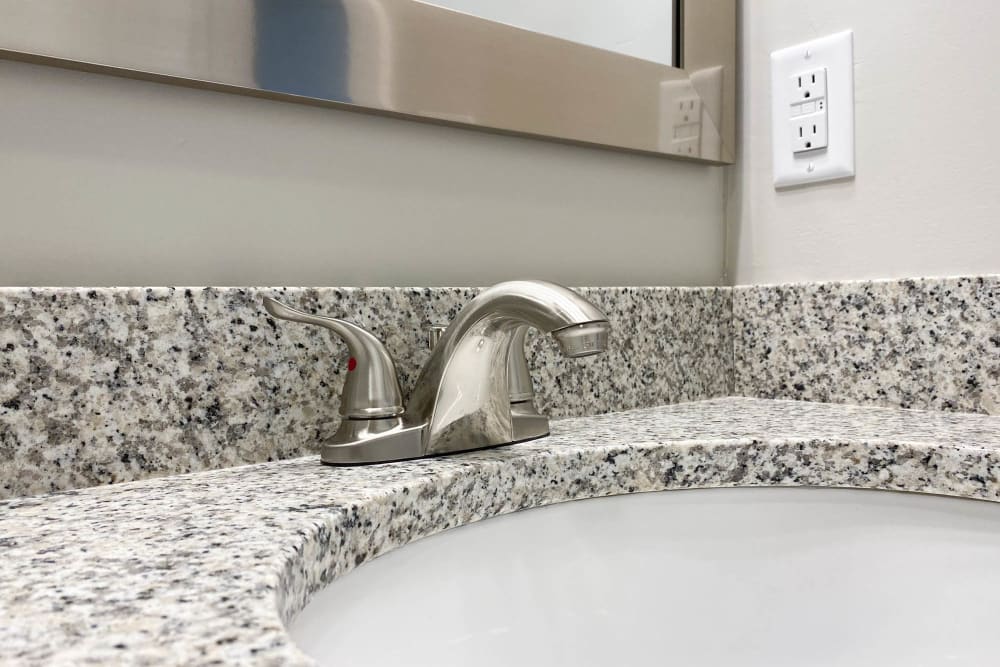 Granite Countertops Carried Into Upgraded Bathrooms The Hills at Oakwood Apartment Homes in Chattanooga, Tennessee