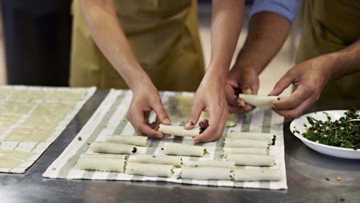 chefs preparing filled pasta for dinner at an Italian restaurant in Jacksonville
