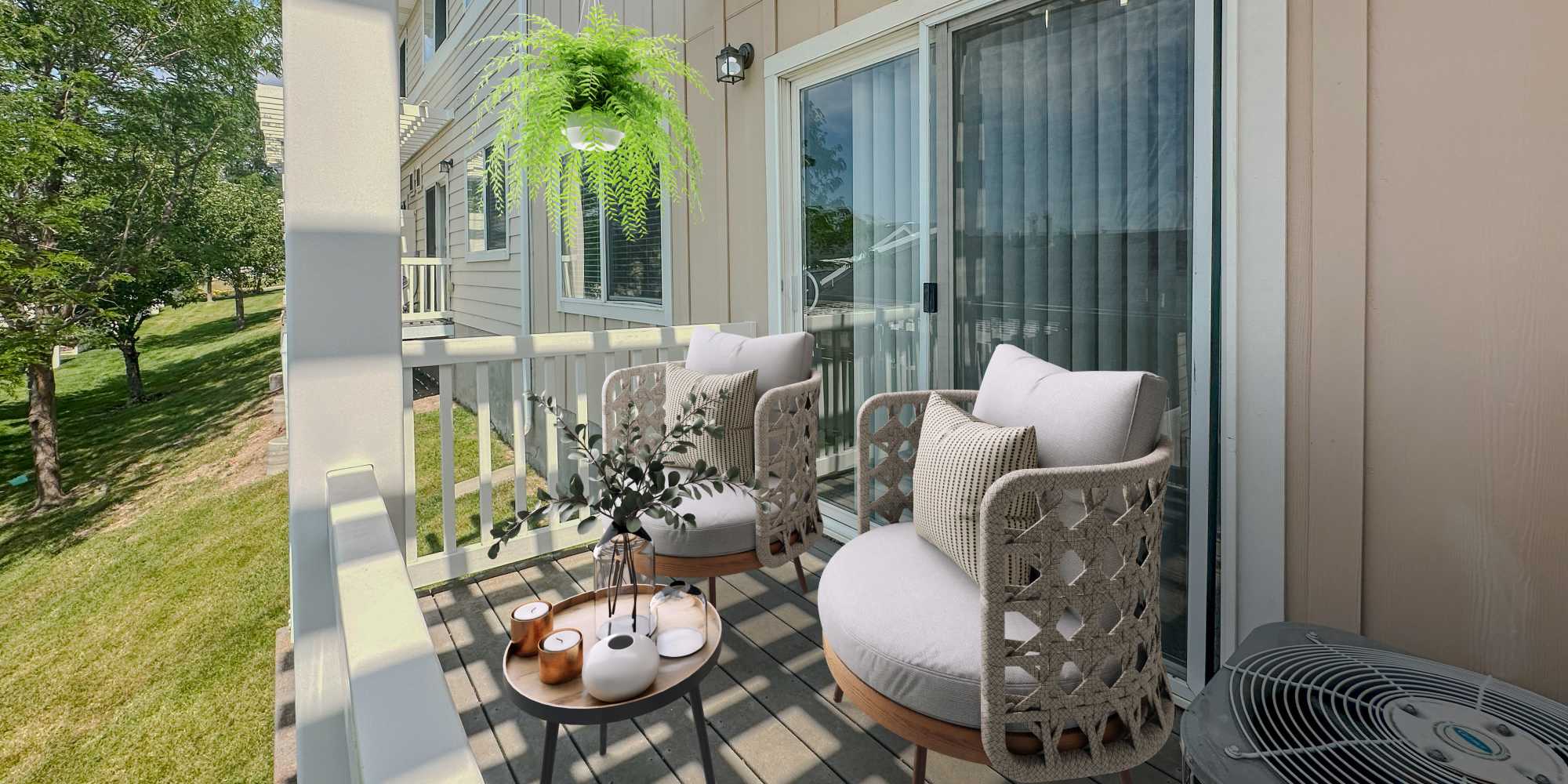 Balcony with two chairs and table at Liberty Hill in Draper, Utah