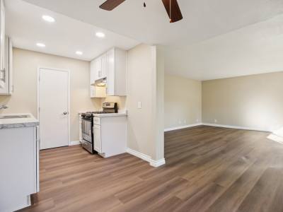 View of kitchen along with living room open layout amenities at North Pointe Villas in La Habra, California